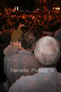 A young boy clings to his father at the Anzac Day Dawn Service, Currumbin 2007.