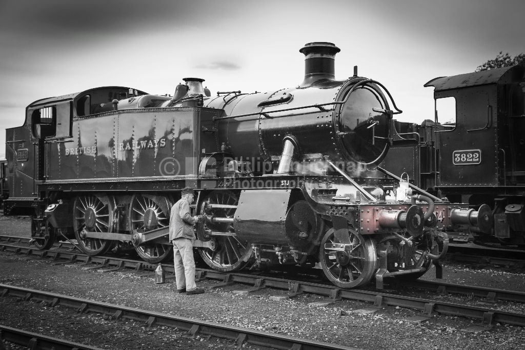 Engineman oiling class 2-6-2T 'large prairie' locomotive