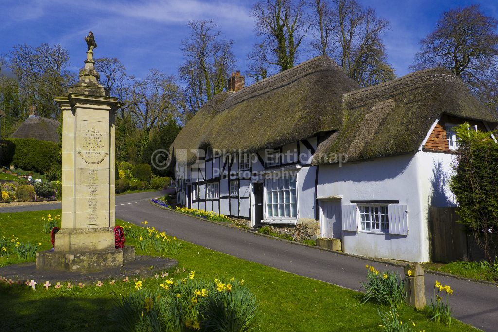 Thatched Cottage and War Memorial Wherwell,Hampshire ,England.