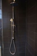 Exposed thermostatic shower valve with fixed head and divertor to handset