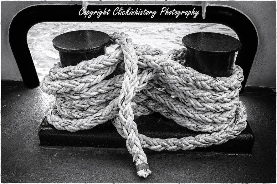 Two holding a single thread
