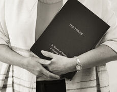 Printed Torah with English translation and commentary