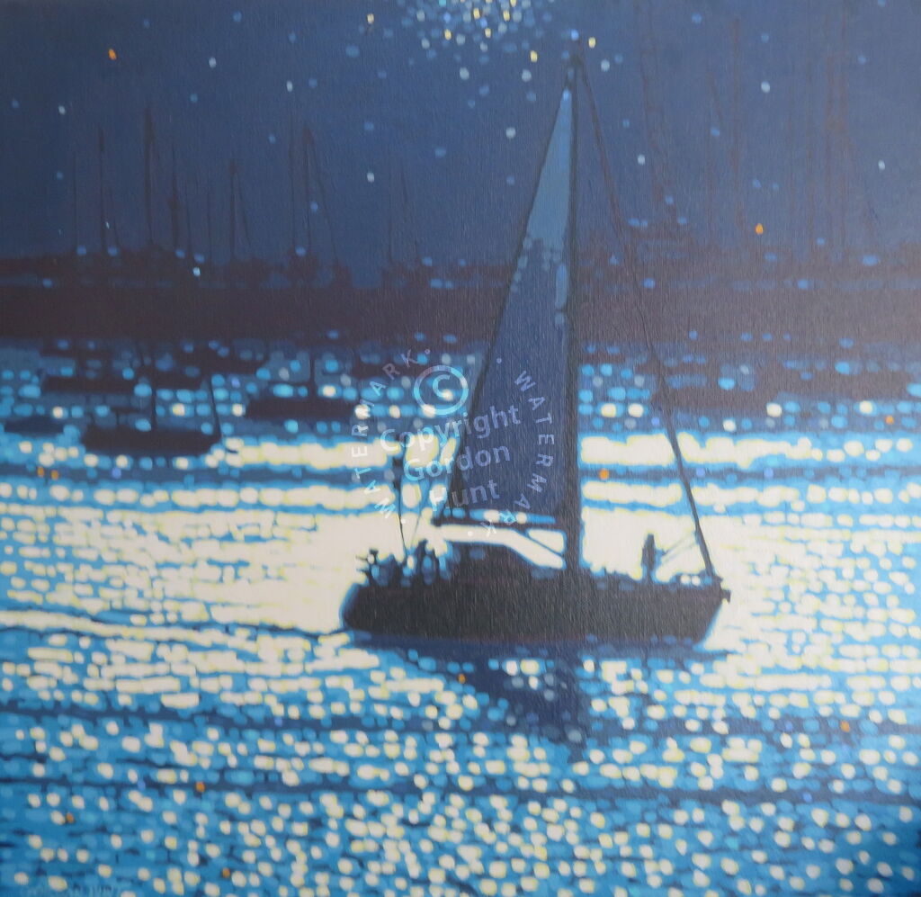 A yacht sails out to sea in bright morning sunshine