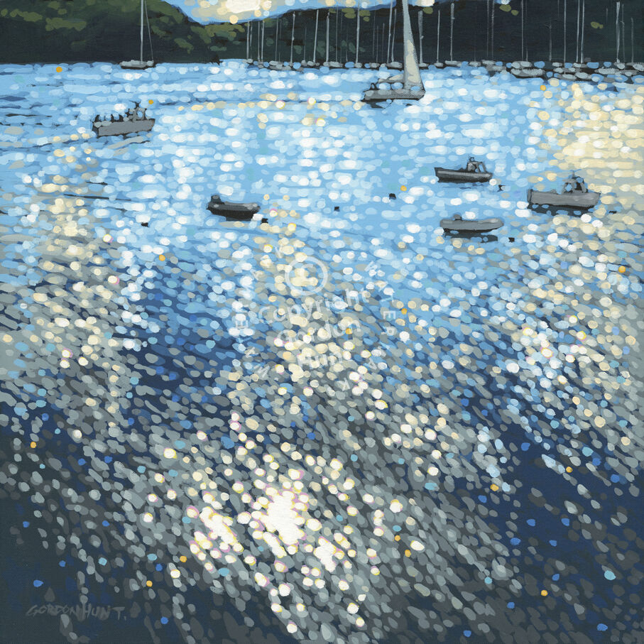 summer sunshine reflected on the waters of the harbour, with yachts moored