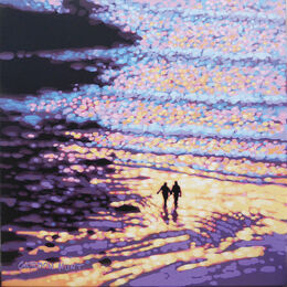 A couple walk on the beach. Gordon Hunt