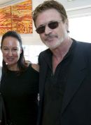 Patrick Bergin and Anita Ellison