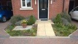 Private small front garden T Lawn