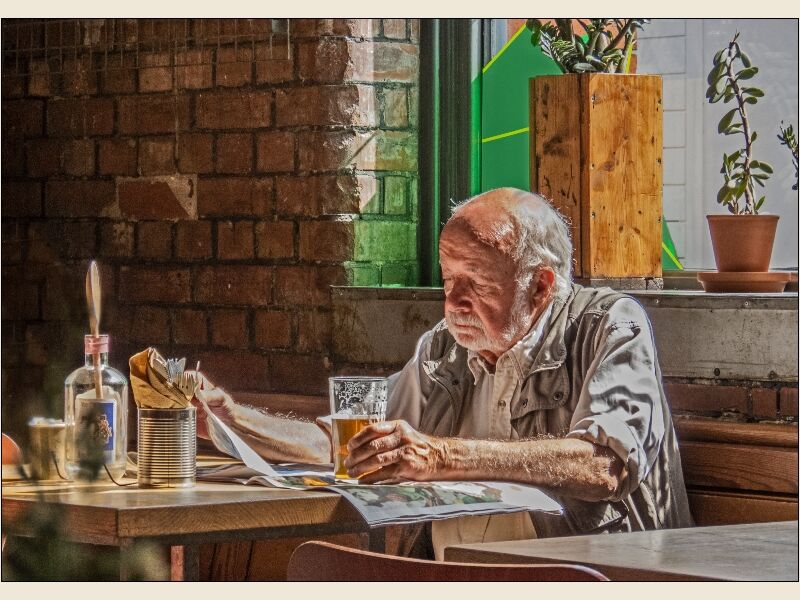 Print: Engrossed in the Paper by Bruce Gibbs-Highly Commended