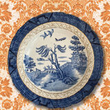 Vintage Willow Pattern plate with easyJet plane
