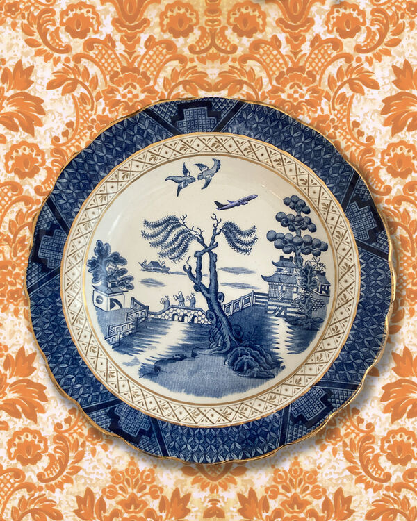 Vintage Willow Pattern plate with Ryan Air plane