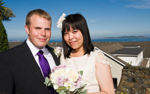 The couple at the OGH, with Herm in the background.