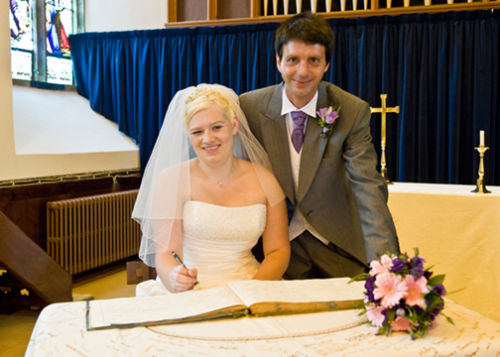 Claire & Dale sign the register.