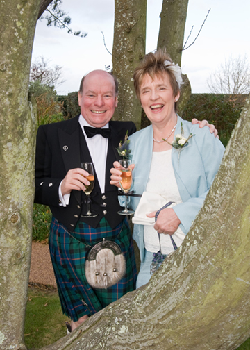 Jean and Ken framed by the tree.