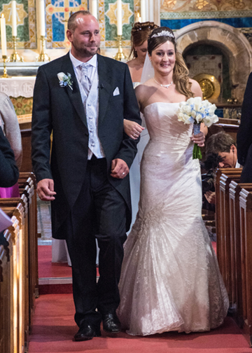 Coming down the aisle.