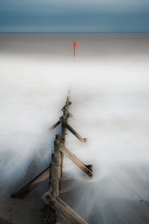 Groynes at Withernsea taken about midday in December using a 10 stop neutral density filter to capture movement and smooth out the white tonality of the waves