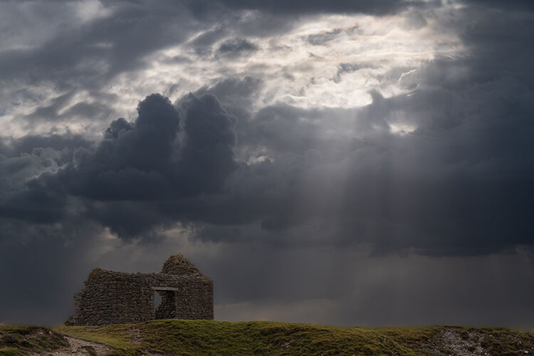 BENEATH THE TROUBLED SKY