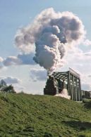 Crossing a river bridge.