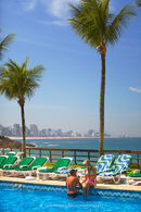 Couple in hotel pool, Ipanema, Rio de Janiero, Brazil