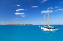 Yacht in lagoon, Mana Island