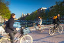 Cyclists crossing bridge, Amsterdam, Netherlands