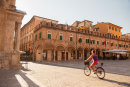 Cyclist in Piazza del Popolo, Ascoli Piceno, Le Marche