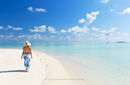 Woman on beach, Maldives
