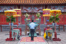 Man praying at Mieu Temple, Citadel, Hue