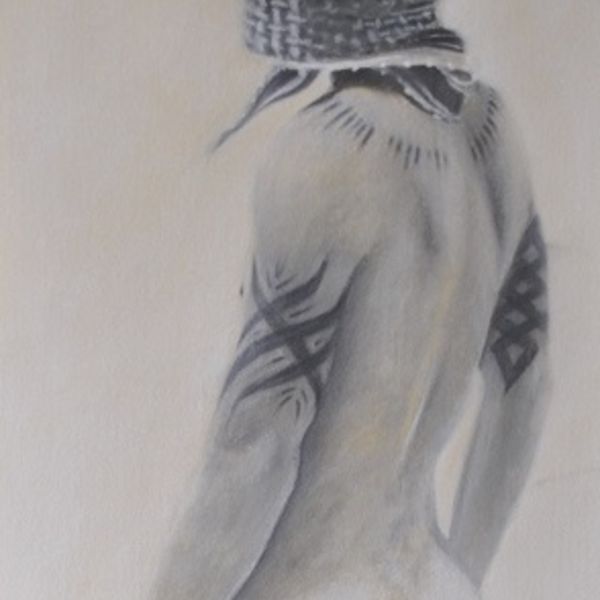 Boy With Tattoos Wearing A Keffiyeh
