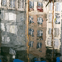 Square reflections of town houses in the old port of Honfleur, Normandy, France