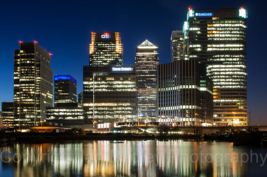 Reflected light of Canary Wharf at night, London, England