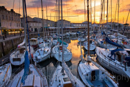 Sunset over the yacht basin at St Martin, Ile de Re, France