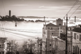 Mist on the sea and harbour from a San Franciso city hill street, California, USA