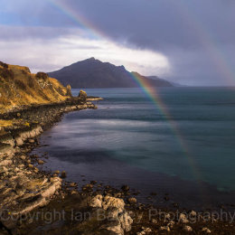 Double rainbow over the sea and mountains on the east coast of the, Isle of Skye, Scotland