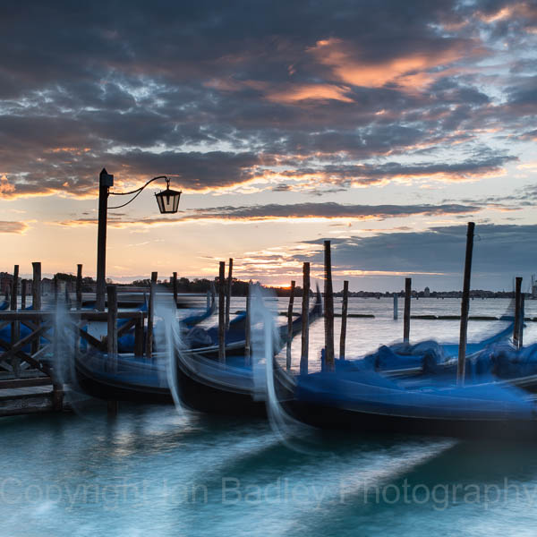 Moving Gondola, at sunrise, Venice, Italy