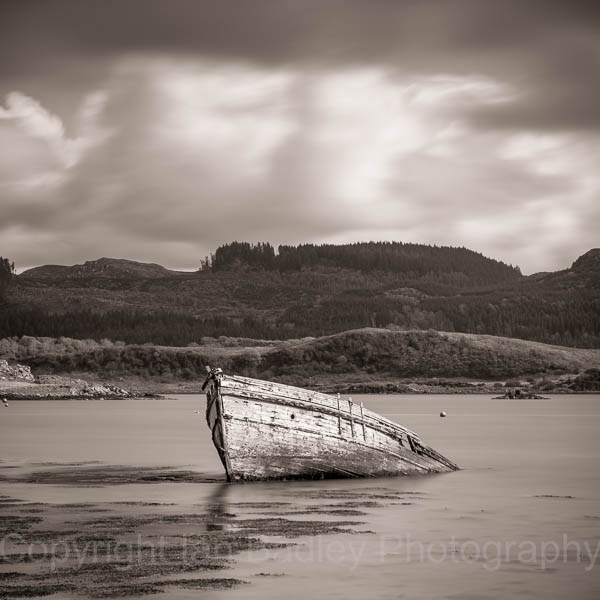 Sunken wooden boat on the west coast of Scotland