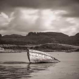 Sunken wooden boat on the west coast of Scotland