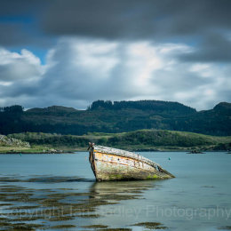 Sunken wooden boat on the west coast of Scotland