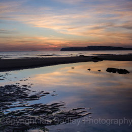 Sunset reflections at Compton Bay, Isle of Wight, England