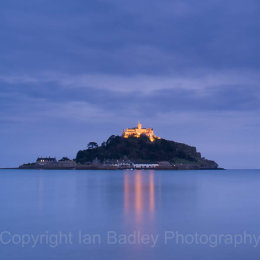 Reflected lights of St Michael's Mount, on a smooth sea, Cornwall, England