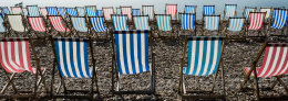 Striped deck chairs at Beer, Devon, England