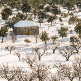 A snow covered 'cabane' in the Luberon, France