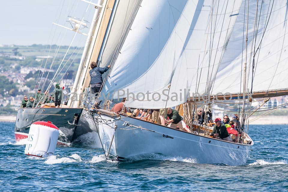 Classic yachts close to the buoy