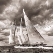 Classic yacht 'Adela' against a stormy sky