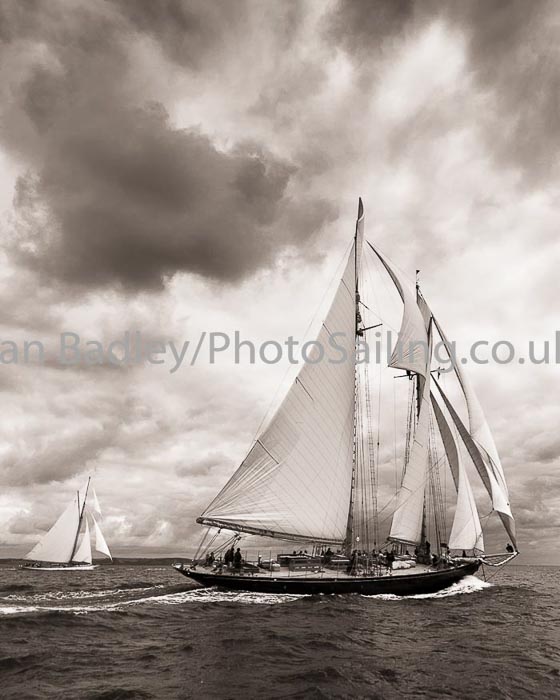 Classic yachts against a stormy sky