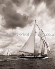 Classic yachts against a stormy sky