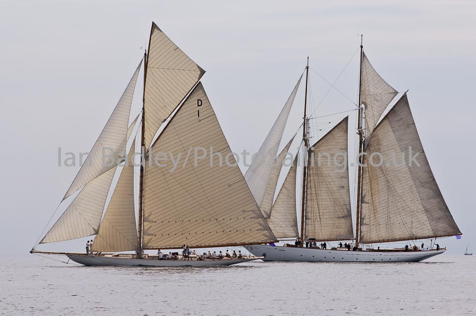 Two classic yachts drifting
