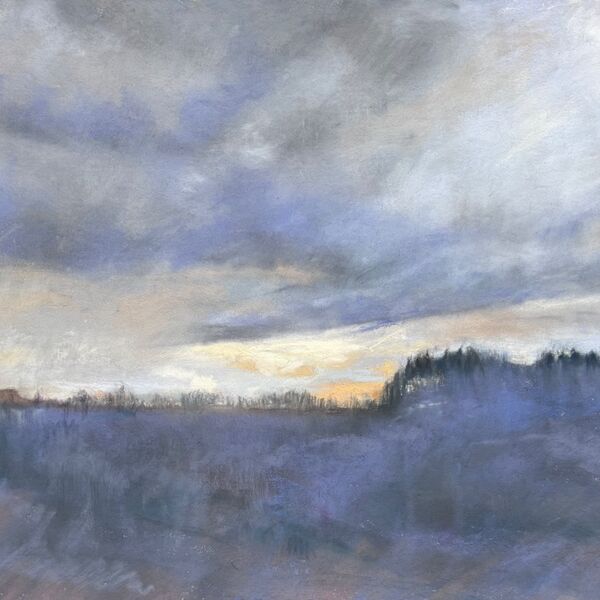 View across the Belbo Valley late afternoon with sunset and purple clouds