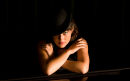 Lady at the Piano in Bowler hat
