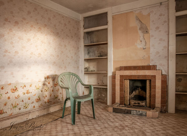 Green Chair in Back Room