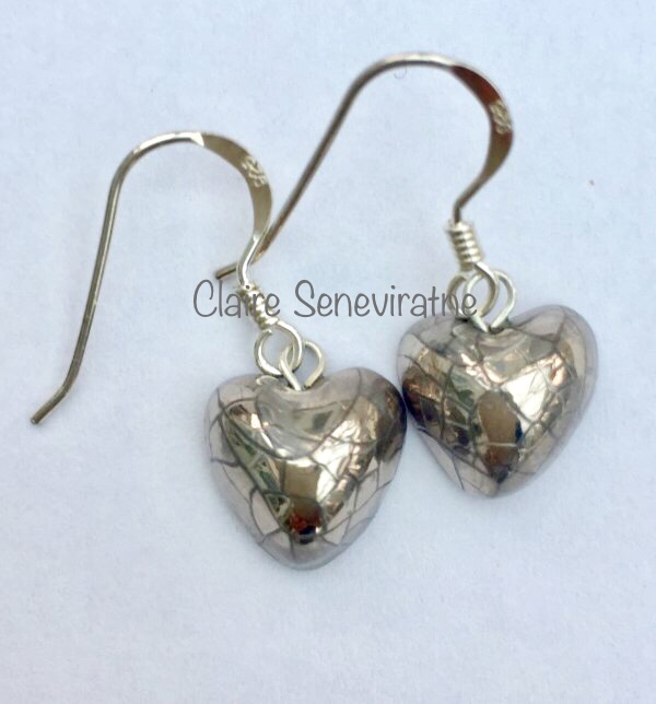 Heart earrings with silver lustre.